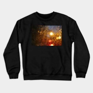 Deatil of raindrops on a car windshield at night Crewneck Sweatshirt